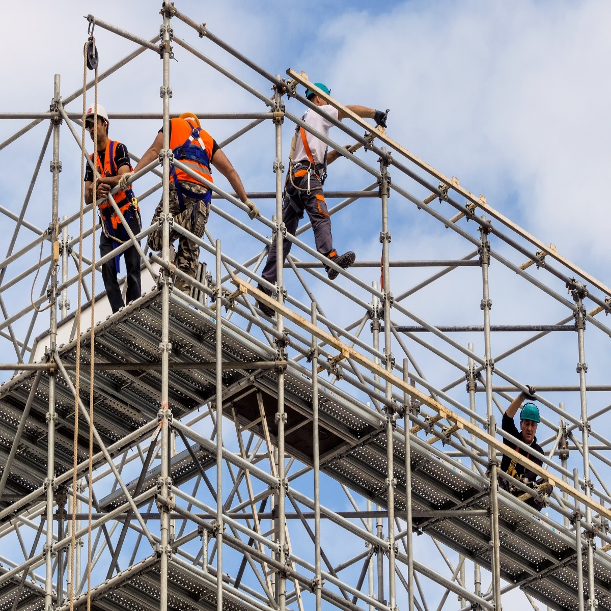 Workers Using Safety Procautions while on Scaffolding | Working at Heights: Getting Up