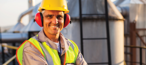 safety employee wearing ear protection muffs