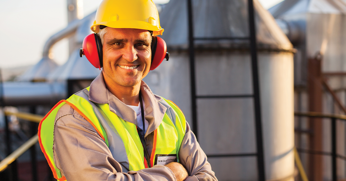 safety employee wearing ear protection muffs