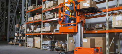 forklift in industrial storeroom facility moving mro products