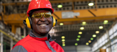 Industrial employee with safety hearing protection