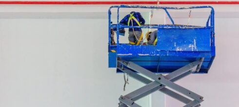 Safety employee on aerial lift