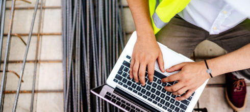 safety employee on laptop computer